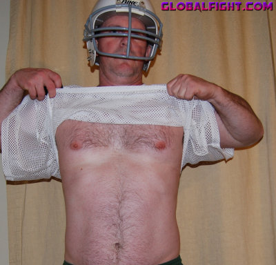 football hunk removing shirt.JPG