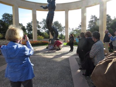 John laying wreath