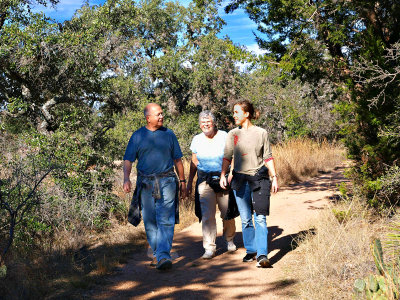 Dad, Mom and daughter hiking Loop Trail