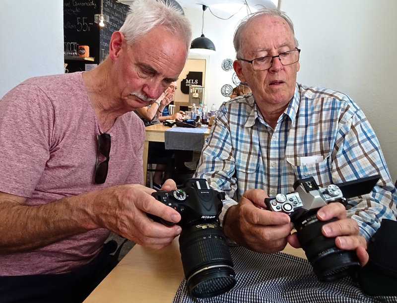 Two photographer friends meet up unexpectedly