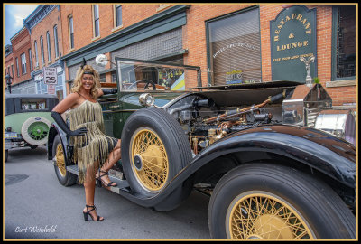 Lisa admires a Rolls Royce