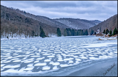 Snow patches on Lyman Lake