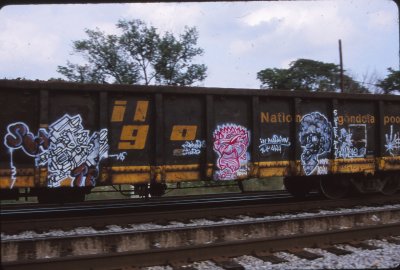 Railgon gondola graffiti heads July 21 2001.jpg
