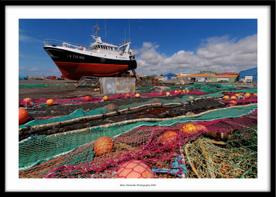Fishing boat and nets, La Cotiniere, France 2008