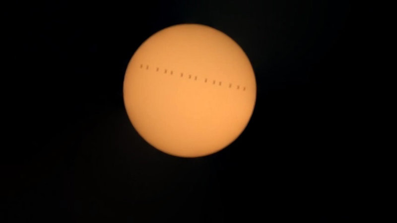 The International Space Station transits the Sun