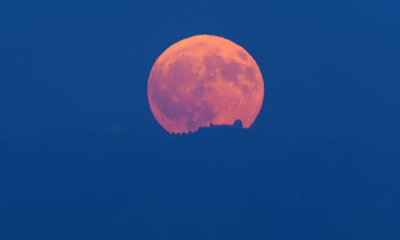 The Harvest moon rising over Lick Observatories
