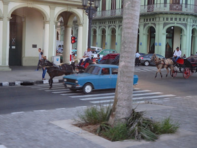 Horse drawn carriages and cars it's all here in Cuba