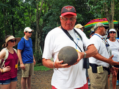 15 Dave studying the stone ball used in ancient Maya or Mesoamerican Ballgame.jpg