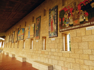 Paintings and plaques given to the church from countries around the world