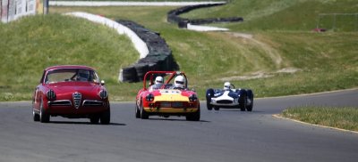 Alfa Romeo, Triumph Spitfire, a Morgan and a Maserati Tipo 61.