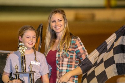 Race winner and trophy girl.