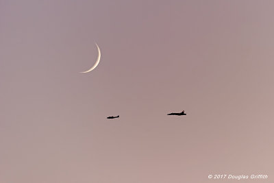 Under the Waxing Moon: Silhouettes of de Havilland Vampire and CF-18 Hornet