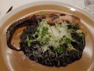 Octopus with mascarpone rice and squid ink