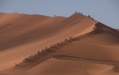 Hikers queing up to climb Big Daddy Dune, Namibia,
