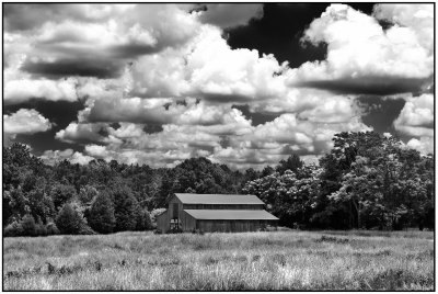 Barn and Clouds on Summer Afternoon
