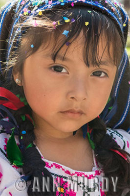 Portrait of little girl wearing rebozo