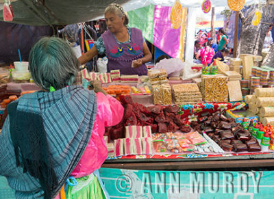 Lady buying dulces