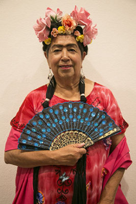 Frida holding fan