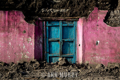 Pink house with damage