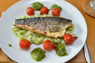 Grilled Sea Bass with Broccoli Risotto, Pesto and Roast Tomatoes