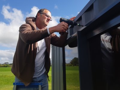 Alan installing the flashing, 20181013_160649.jpg