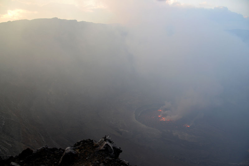 The interior of the crater has a large flat area at 10,400 ft with a smaller depression containing the lava lake