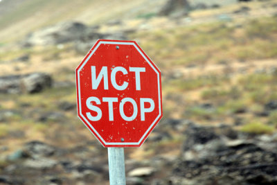 Bilingual stop sign, Tajikistan