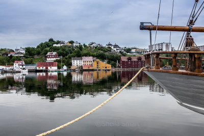 Kristiansund, Norway with boat in foreground 