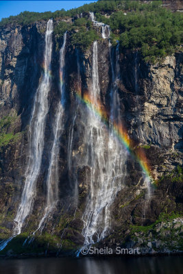Rainbow at Seven sisters waterfall in Geirangerfjord
