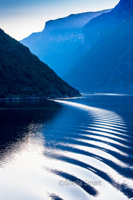 Ripples from wake of Queen Victoria in Norwegian fjords 