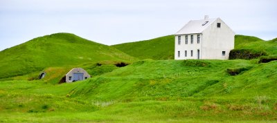 White house and turf barns by Vik Iceland 365 