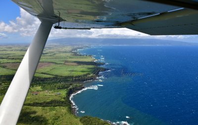 Looking toward Paia and Kahului,  Mauna Kahalawai (the West Maui Mountains)  