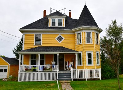 Bright yellow house on Orr's island Maine 299 
