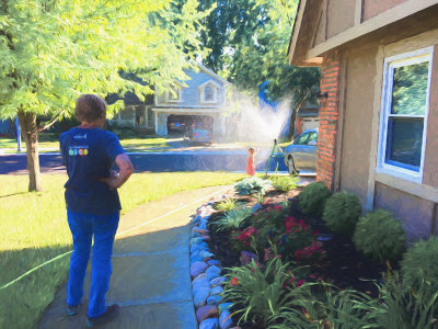 Playing In The Sprinkler