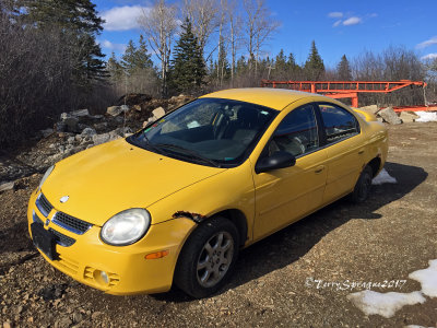 abandoned yellow car