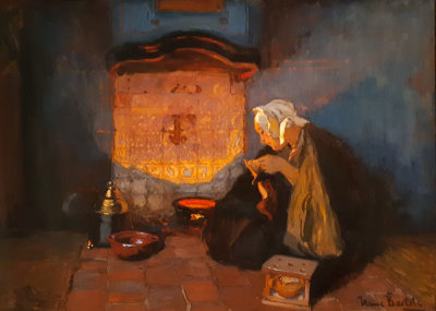 Young fisher's woman at the open fire.