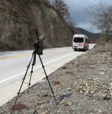 The Ecuadorian highway had no real shoulder, so the van had to be parked partly on the road.