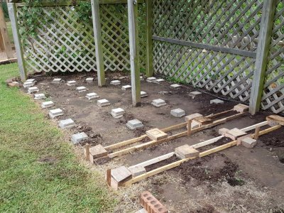 Because of various flaws in my workmanship, I had to dig up and re-seat 4-5 piers to make them level or in line with the others, further slowing down my progress.