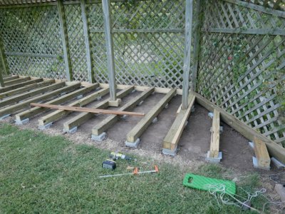 I also used some plate pad material as a moisture barrier on top of each pier and used some 2 x 4 material for decking nailers around the trellis vertical supports.