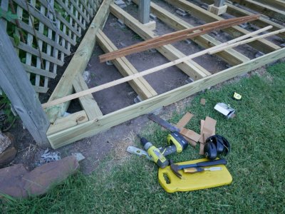 As mentioned earlier, I used the straight-edge made for me while we were working on the house to check the support beams for (reasonable, though not perfect) alignment north to south.