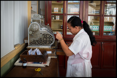 The local pharmacy in Cienfuegos with a very old cash register