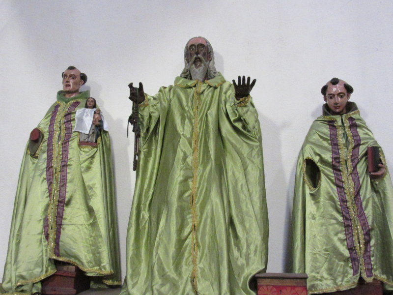 Local women make new clothes for these saints every year