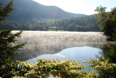 Misty morning on a mountain lake