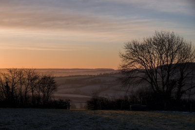 Frosty sunrise on the hills near home