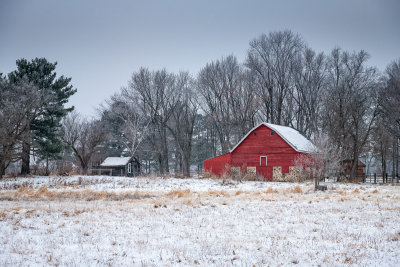 Little red barn on a frosty 