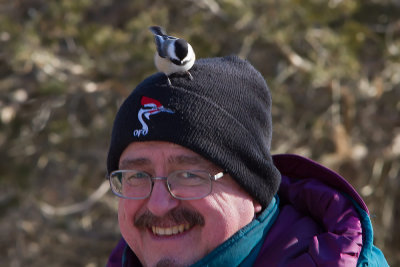 8169 Kevin and Black-capped Chickadee.jpg