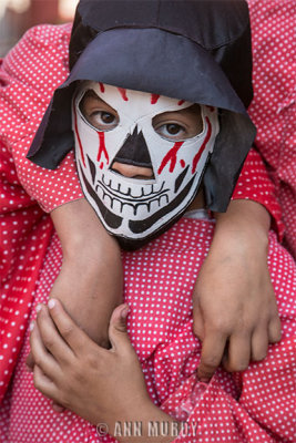 Child masked dancer