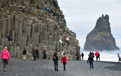 Tourists and Column Basalts at Reynisfjara is a world-famous black-sand beach, Vik, Iceland 1478 
