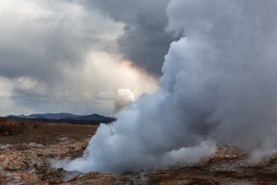 Geothermal hot spring with the volcano in the back 