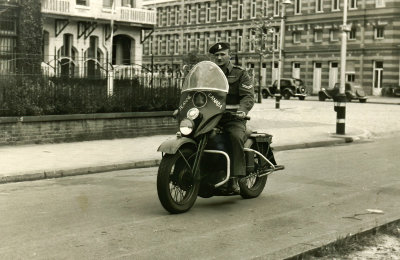 Corporal Riding a Motorcycle